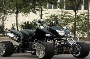 黑色狸猫款超酷型沙滩车四轮越野摩托车沙滩车  庞巴迪越野沙滩车  四轮越野沙滩车报  四驱越野摩托车