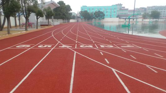 海南省万宁市优质学校操场运动场透气型塑胶 万宁市透气型塑胶跑道