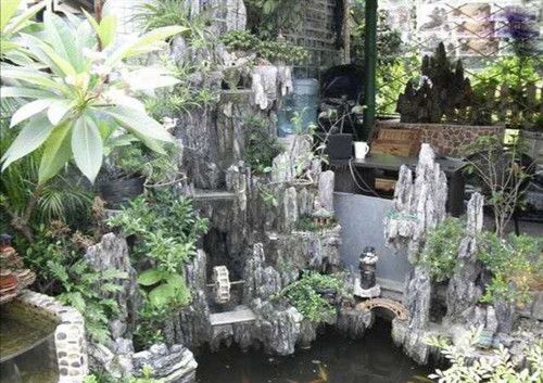 广东英德峰石批发 峰石假山案例图 英石峰石多少钱 ?