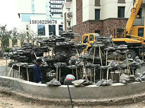 低价大型直销黄蜡石 工程石驳岸石 小区黄蜡石效果图