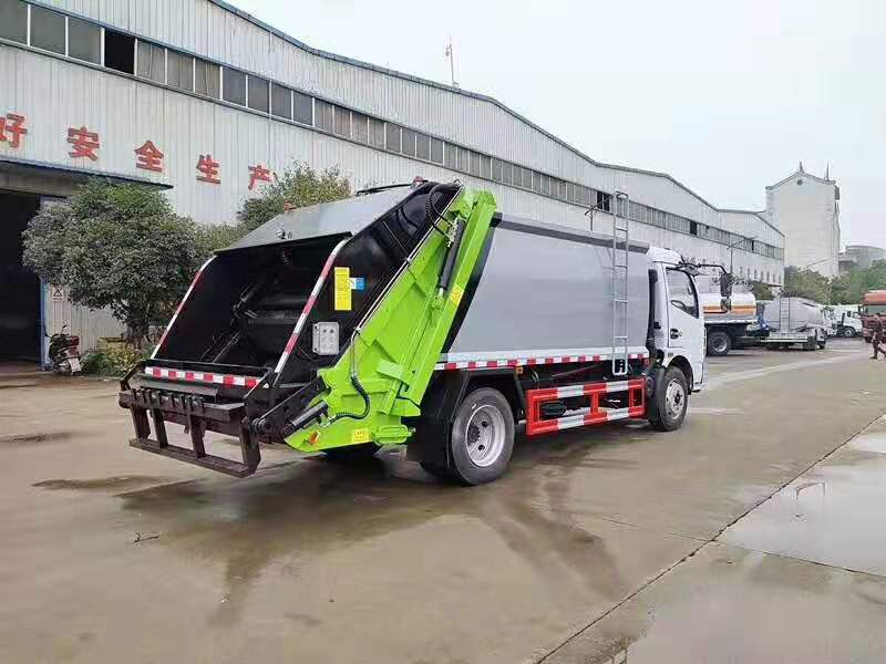 压缩餐厨垃圾车垃圾挂桶垃圾箱厂家让利促销  压缩垃圾车  挂桶垃圾车
