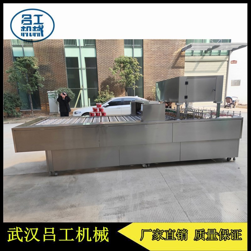武汉吕工牌桶面片膜全自动连续式封口机厂家直销  桶面片膜封口机  纸桶装粉丝封口机  泡面自动包装机