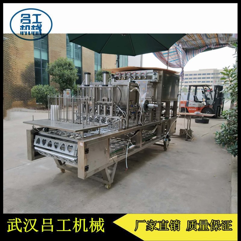 吕工牌火锅伴侣心型盒装牛油全自动灌装封口机厂家直销  牛油灌装封口机  心型盒装液体封口机  异形盒全自动封口机