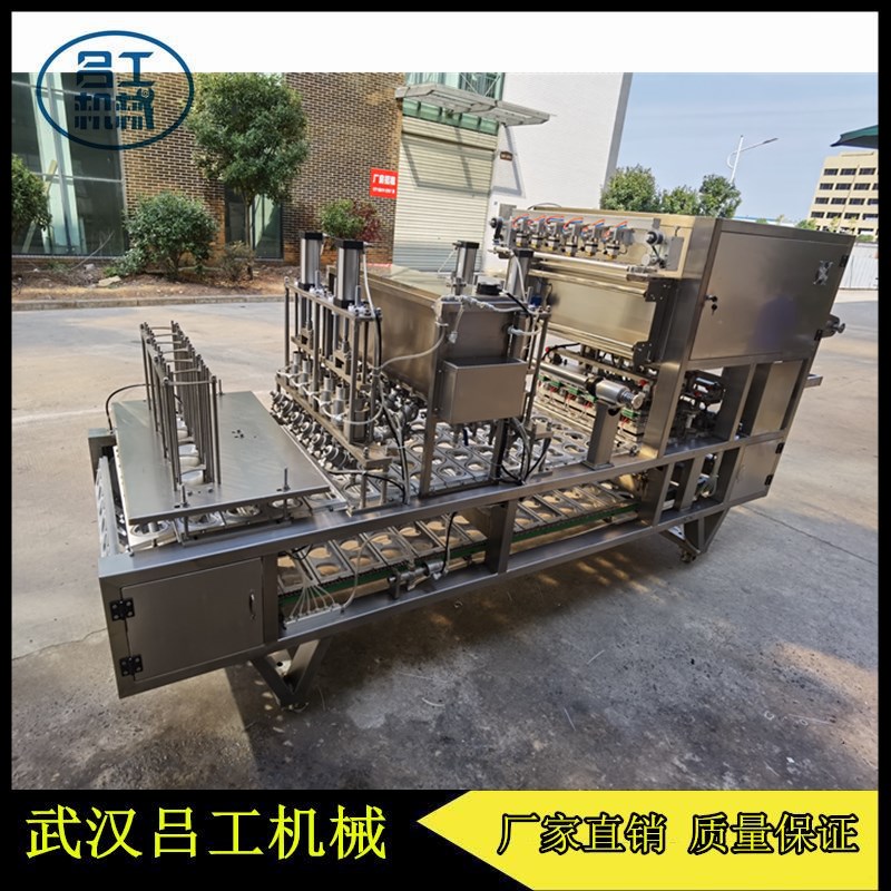 吕工牌火锅伴侣心型盒装牛油全自动灌装封口机厂家直销  牛油灌装封口机  心型盒装液体封口机  异形盒全自动封口机