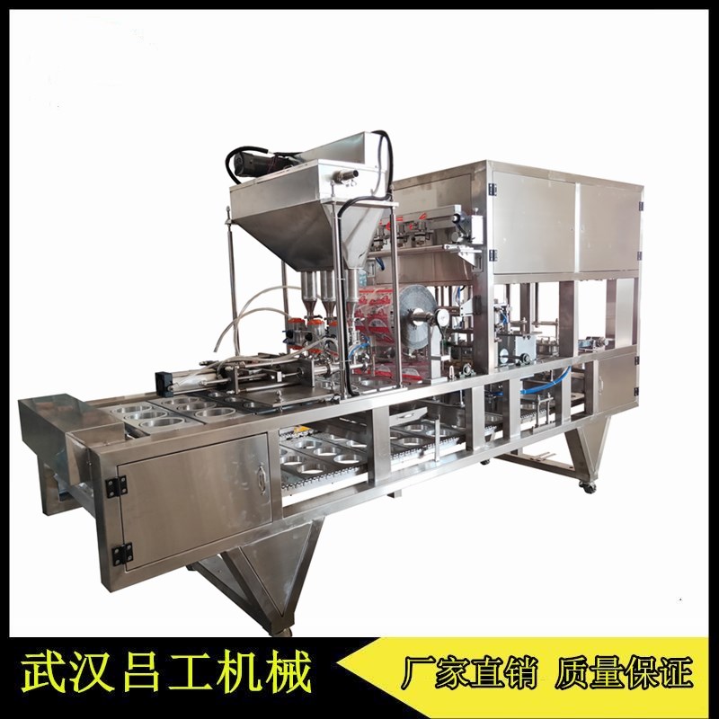 非标定制全自动碗团灌装封口机 碗坨灌装覆膜机厂家  全自动碗团灌装机  碗坨灌装封口机  荞面碗秃灌装封口机