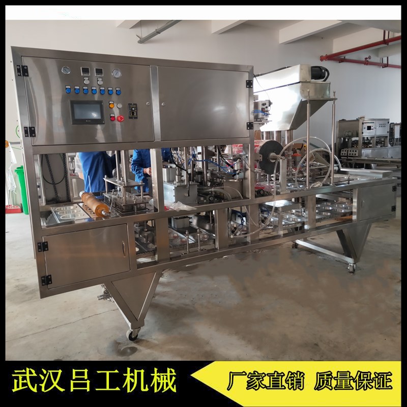 非标定制全自动碗团灌装封口机 碗坨灌装覆膜机厂家  全自动碗团灌装机  碗坨灌装封口机  荞面碗秃灌装封口机