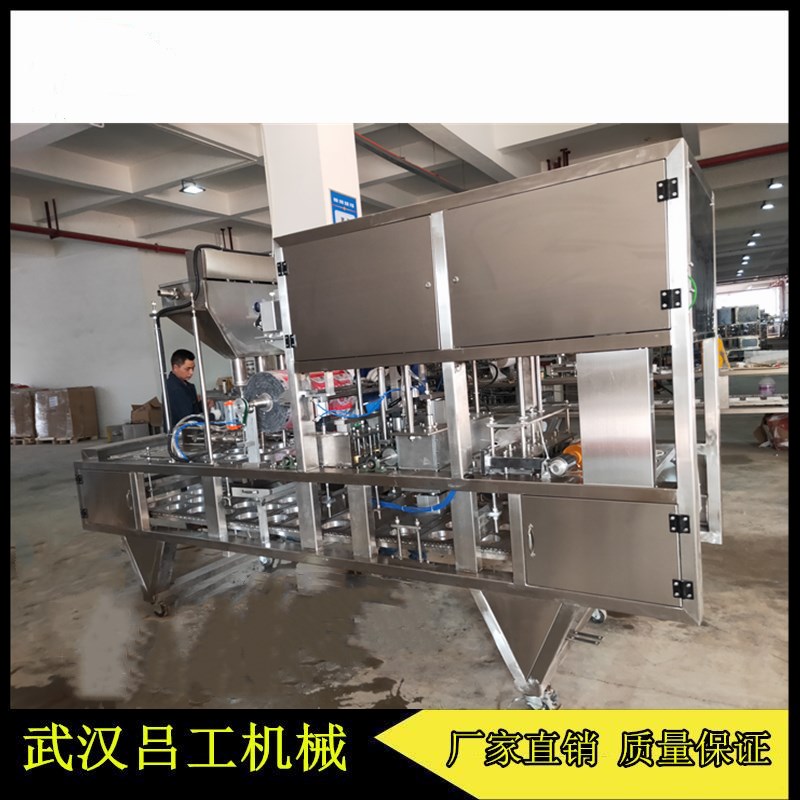 非标定制全自动碗团灌装封口机 碗坨灌装覆膜机厂家  全自动碗团灌装机  碗坨灌装封口机  荞面碗秃灌装封口机