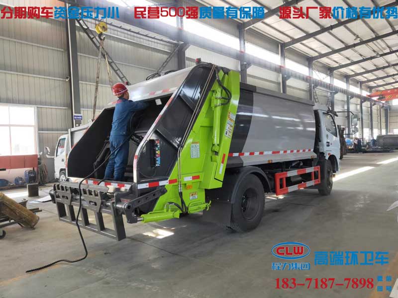 酒泉市能上北京牌的东风福瑞卡压缩式垃圾车