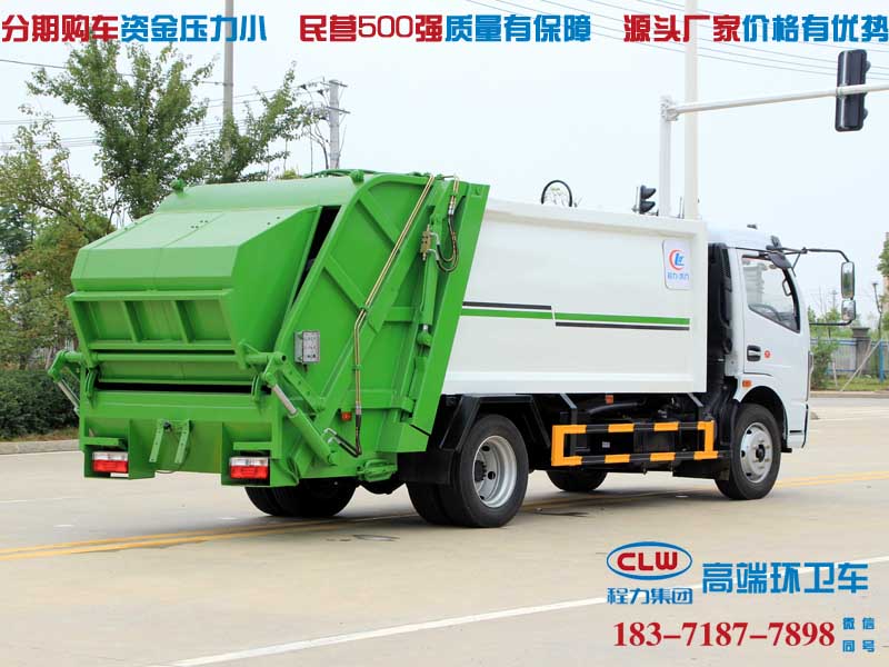 抚顺市能上北京牌的东风多利卡压缩式垃圾车