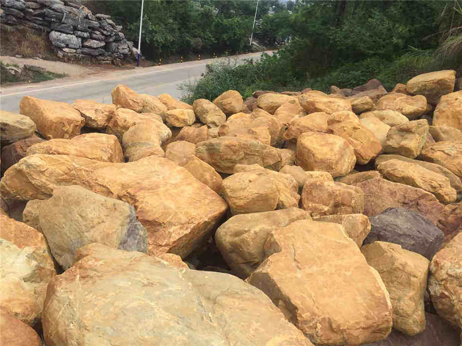 广东黄蜡石吨位石原石厂家原产地大量现货供应  大型吨位黄蜡石  大型园林景观石  草坪点缀、假山制作