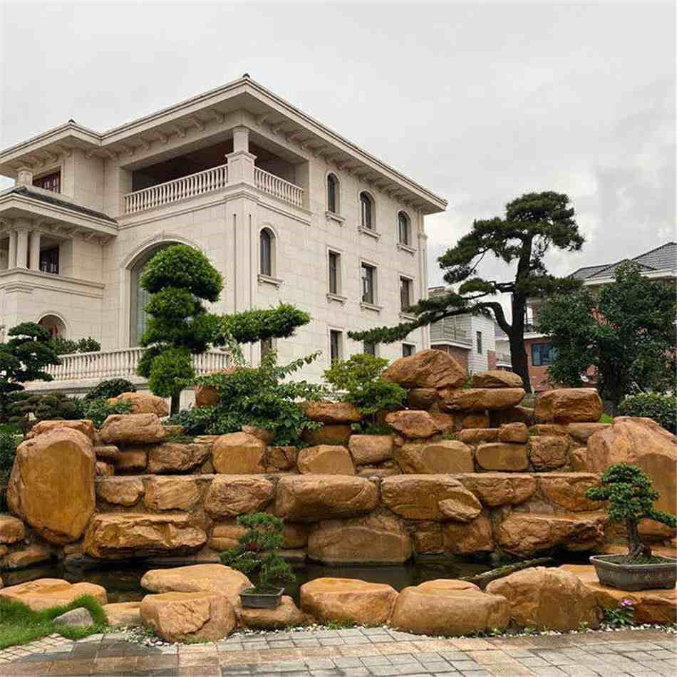 广东黄蜡石假山堆叠水池驳岸石原产地厂家批发  吨位黄蜡石  组合假山、草坪点缀  草坪点缀、村口标志