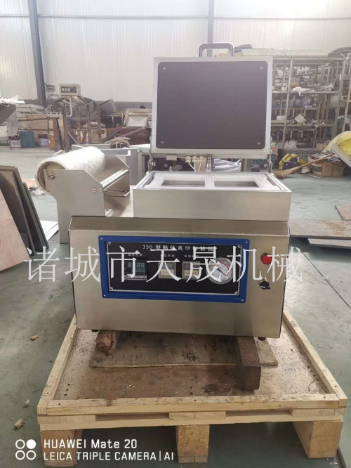 小型贴体包装机，龙虾贴体覆膜机，真空贴体机生产厂家