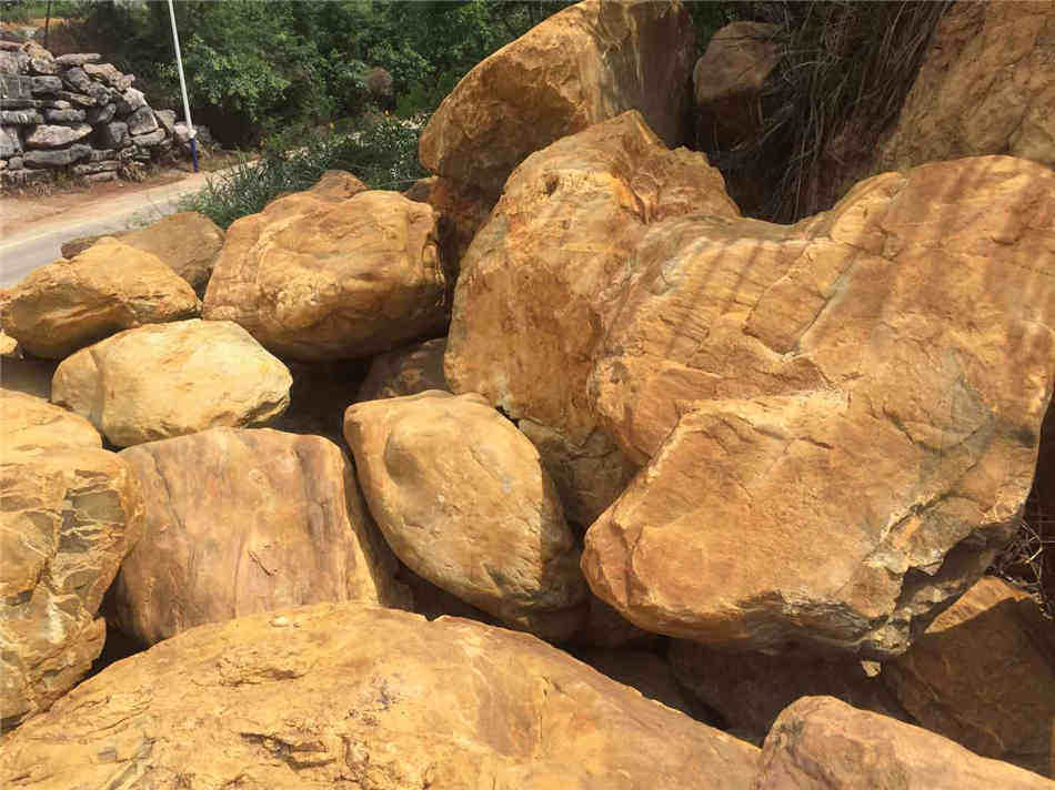 广东黄蜡石批发 天然黄蜡石原产地供应  黄蜡石原石批发  组合假山、草坪点缀  假山制作庭院装饰