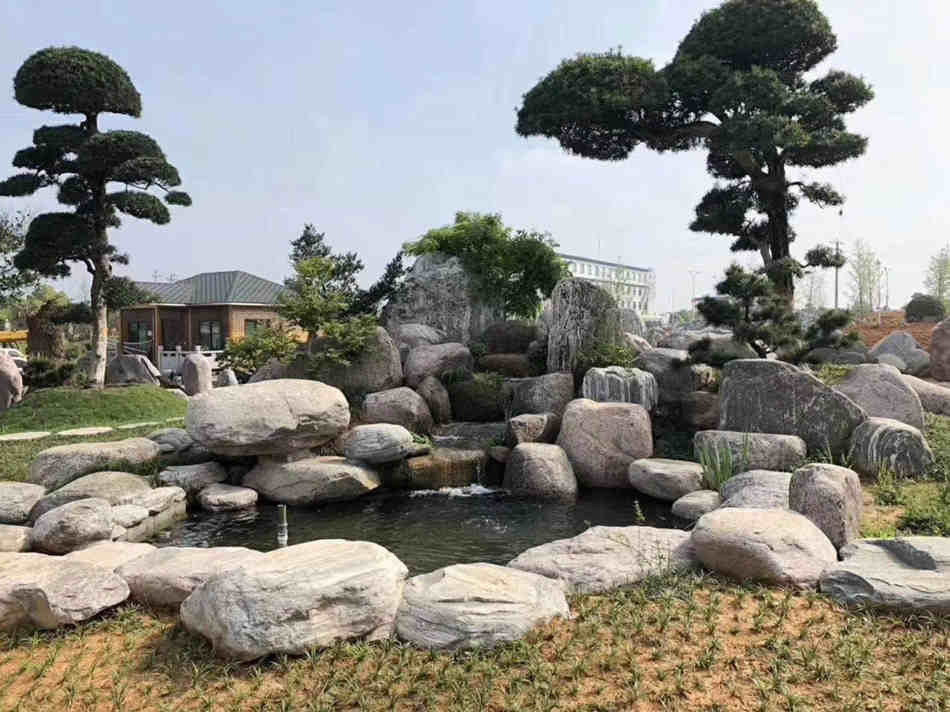 泰山石水池搭建 天然组合假山庭院装饰石材批发  泰山石原石供应  大型园林景观石  假山制作庭院装饰