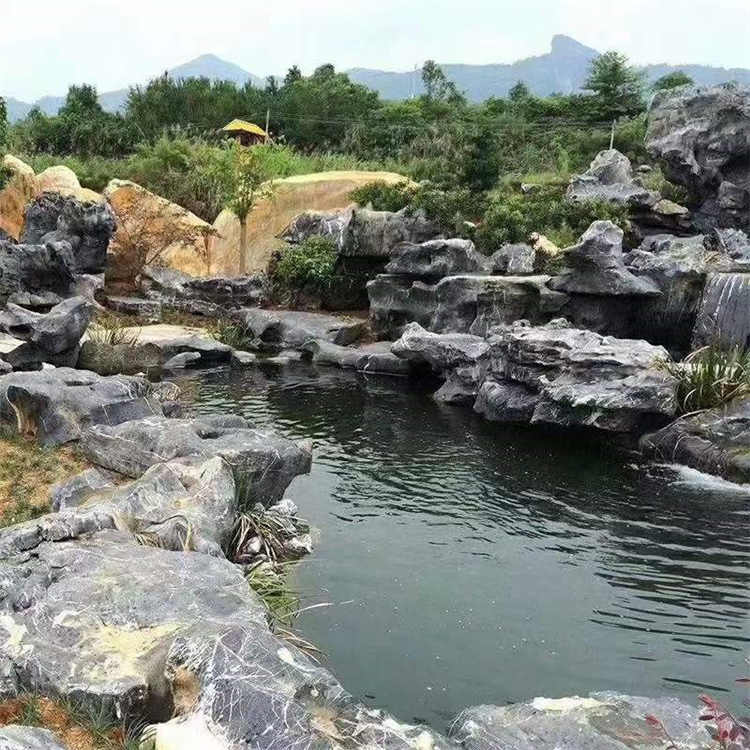 太湖石假山窟窿石 太湖石池塘制作 批发园林景观石厂家