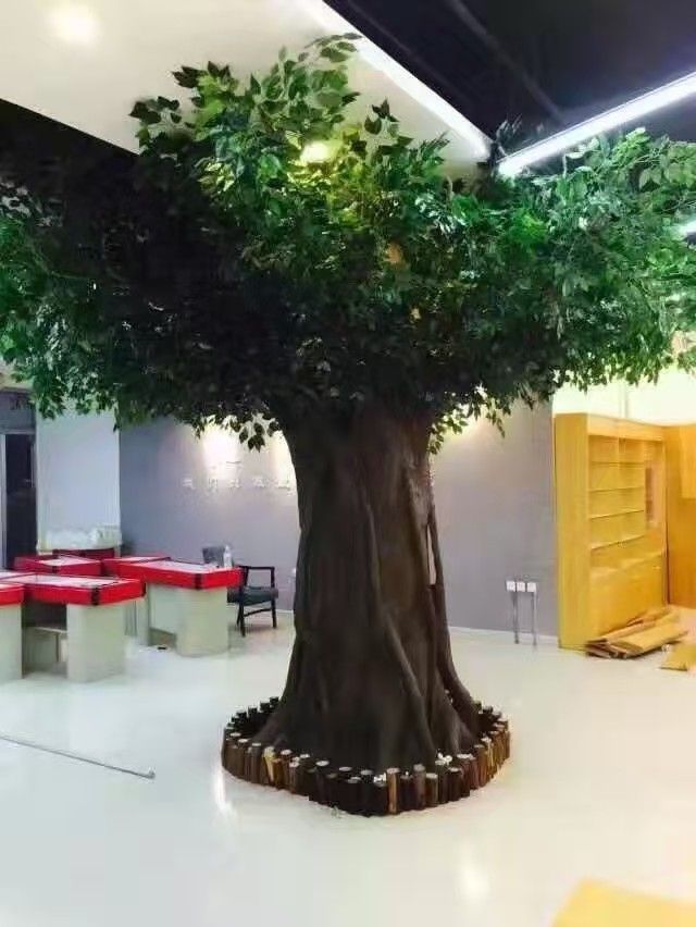 假树兰州室内假树制做造景厂家  假山假树装饰  包柱子假树制做  楼顶假山假树制做