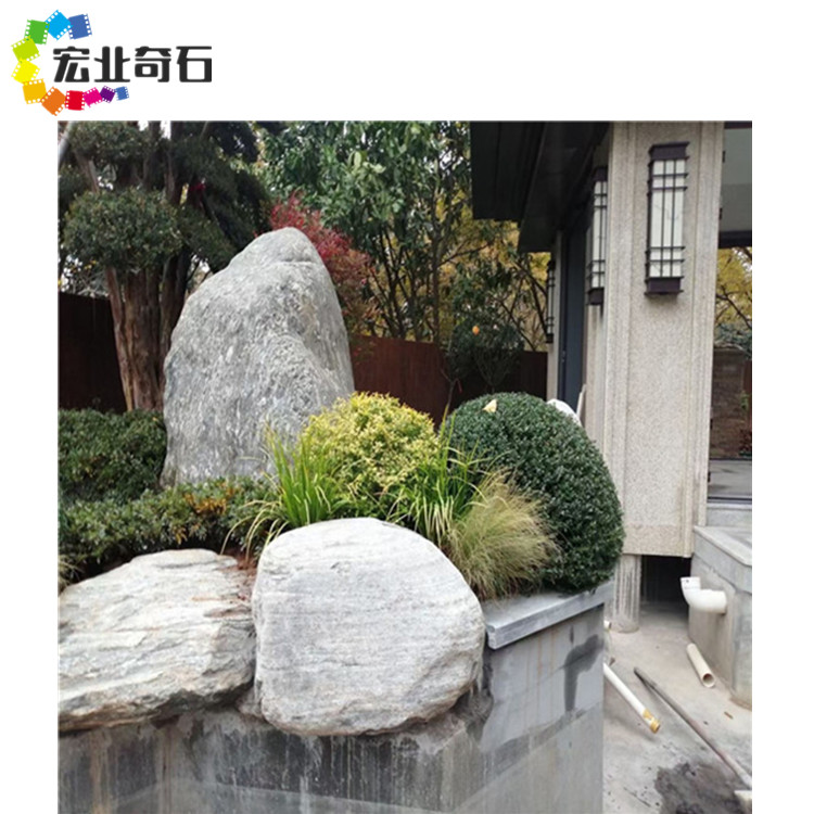 泰山石的应用—新中式园林庭院  泰山石多少元一吨