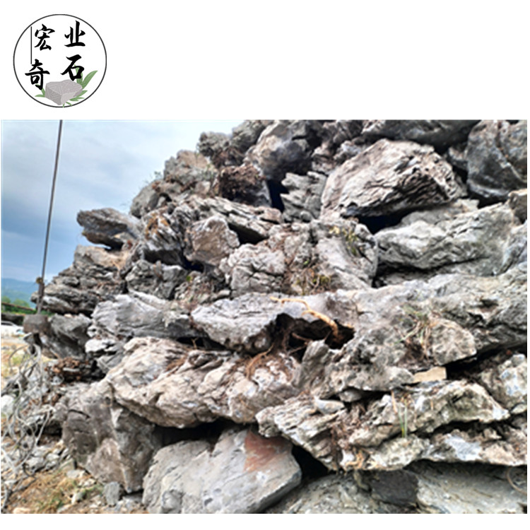 英石草坪点缀造景-清远英石多少元一吨-英石原石图片
