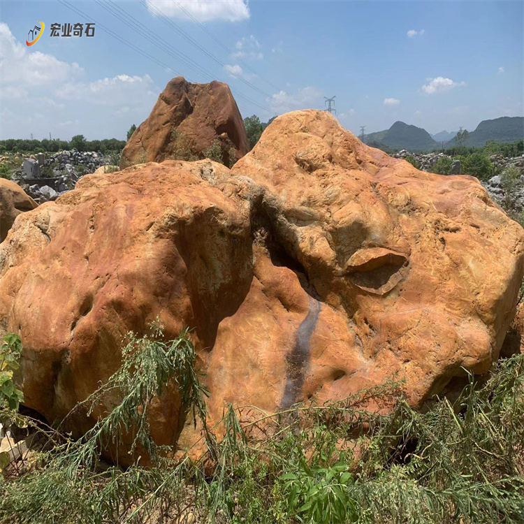 清远黄蜡石堆场-黄蜡石叠置假山设计  黄蜡石产地