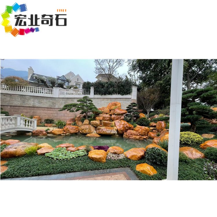 清远黄蜡石堆场-黄蜡石叠置假山设计  黄蜡石产地