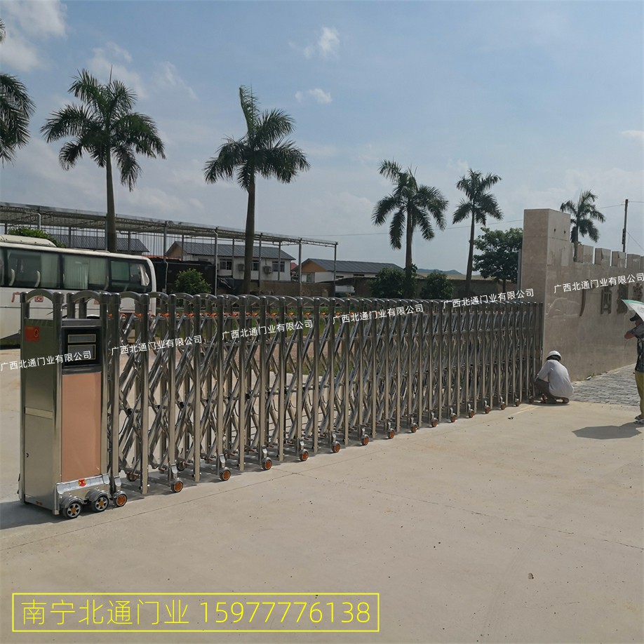 南宁不锈钢白钢伸缩式电动门，电动遥控伸缩门厂  南宁圣田伸缩门  南宁伸缩门安装  南宁工厂电动门