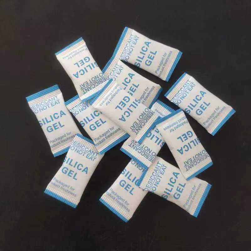 投包机式卷轴干燥剂1克带光标复合纸英文防潮剂