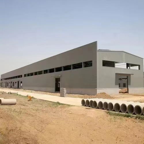 兖州工地钢筋加工棚安装弧型彩钢棚库房  兖州弧型彩钢棚库房
