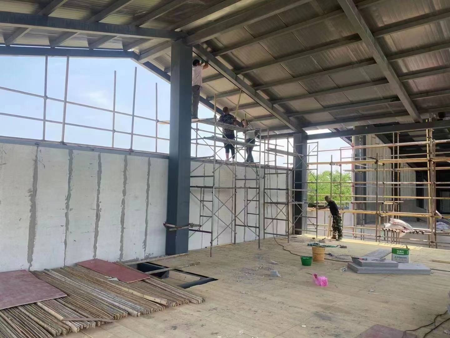 兖州工地钢筋加工棚安装弧型彩钢棚库房  兖州弧型彩钢棚库房